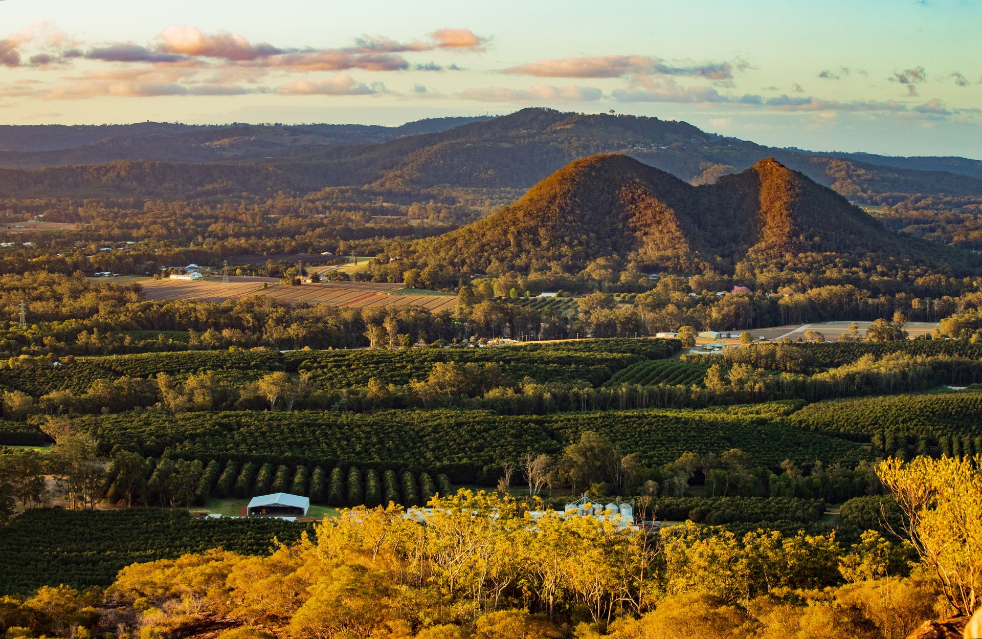The view of the regional area in Glass House Mountains in the dusk from the peak of Mount Ngungun